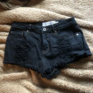 Black ripped shorts